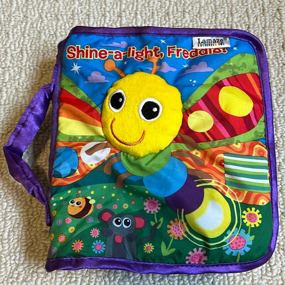 Lamaze - Shine-a-light, Freddie!  Soft material book.